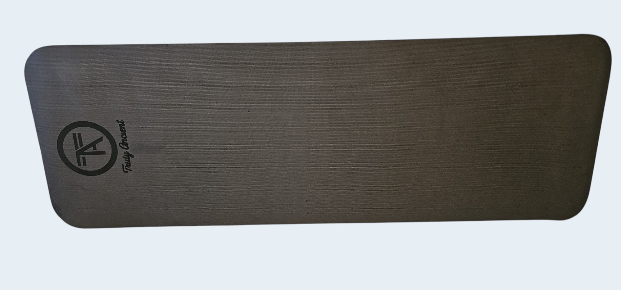 Truly Ancient premium yoga mat rolled up